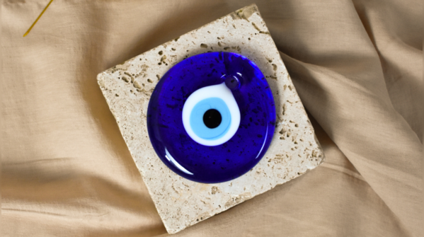 Close-up of a traditional Evil Eye charm.