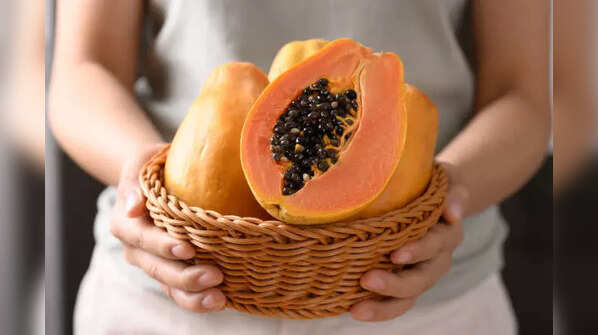A vibrant slice of ripe, orange papaya.