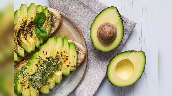 A sliced avocado revealing its creamy texture.