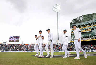 England captain Ben Stokes leading his team onto the field
