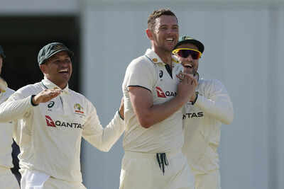 Josh Hazlewood celebrates a wicket against West Indies.