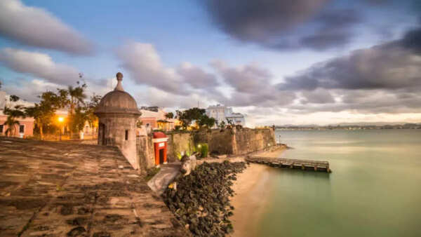 Sunset over a tropical beach, perfect for July travel