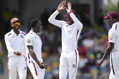West Indies celebrate a wicket against Australia.